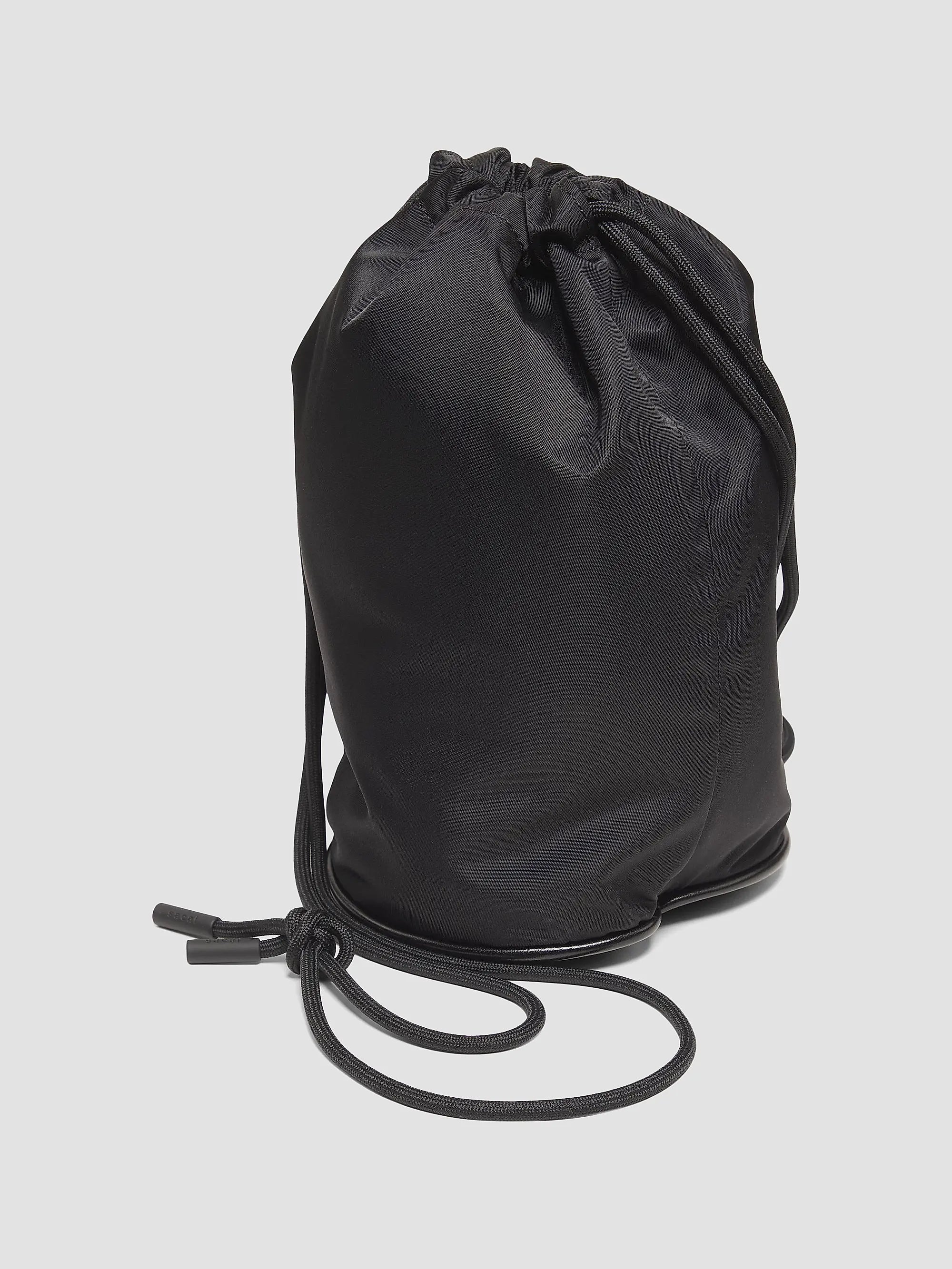Compact Nylon Twill Drawstring backpack Fitted With Outer Independent Zipper Pocket