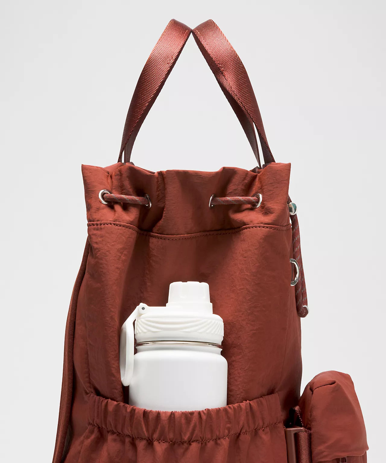2-in-1 Convertible Drawstring backpack Equipped With Detachable Crossbody Pouch and Water Repellent Surface