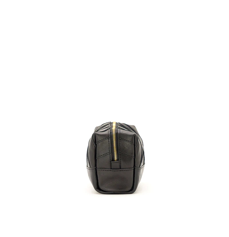 Geometric Stitched Sustainable Scrap Leather Makeup bag Equipped With Brass Zipper and External Carry Strap